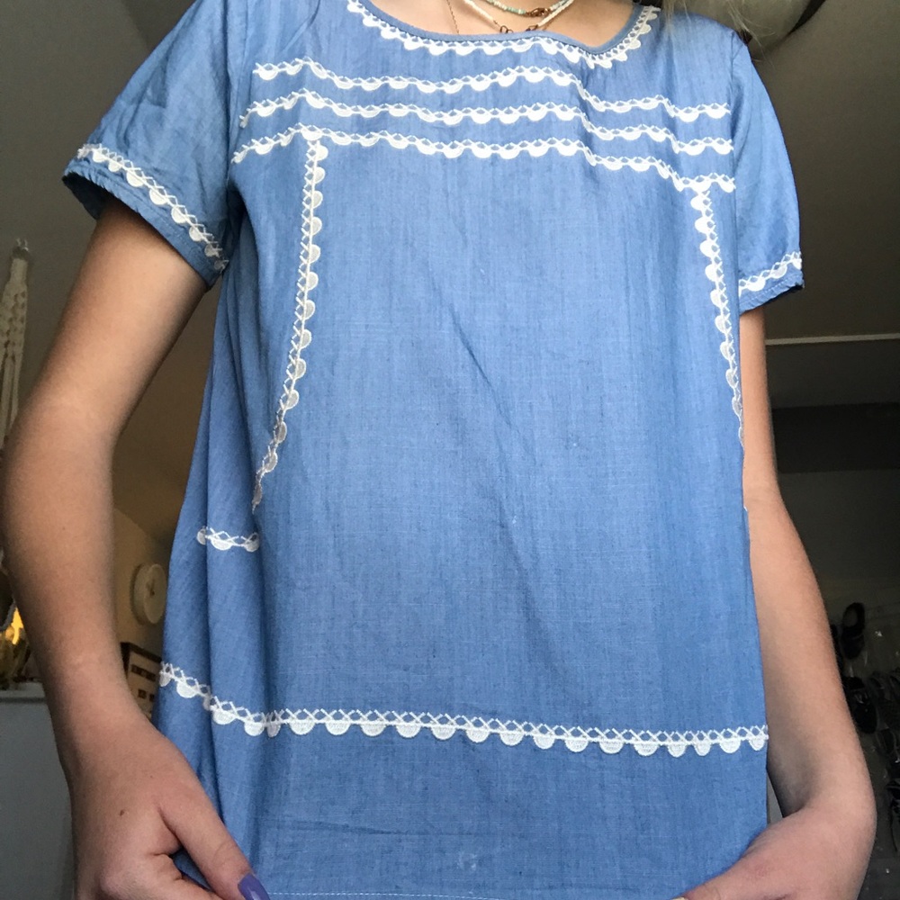blue top with white lace embellishments!